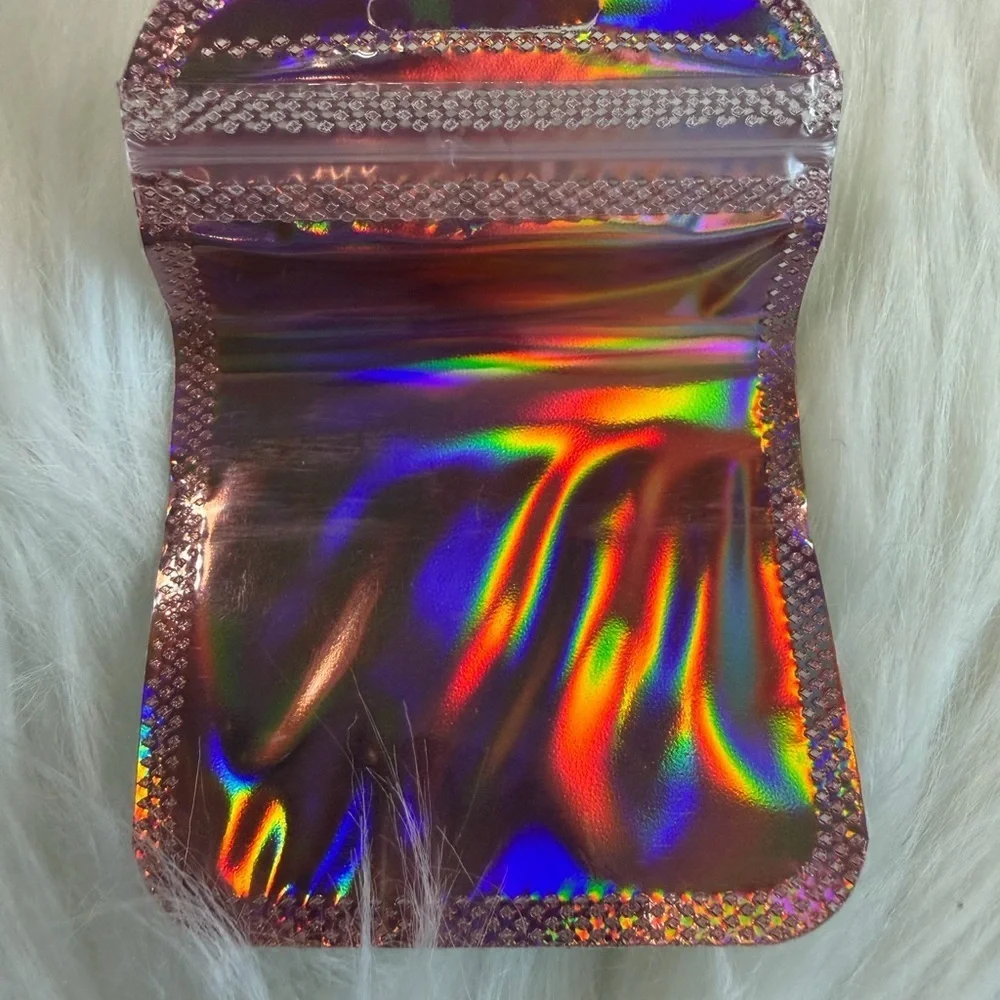 💜3/$15   50 pieces Holographic Pink Pouches